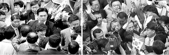 한나라당의 박근혜 전 대표(왼쪽 사진)와 이명박 전 서울시장이 29일 지지자들의 환영을 받으며 경제분야 정책 토론회장인 광주 5·18 문화회관으로 들어서고 있다. 광주/연합뉴스