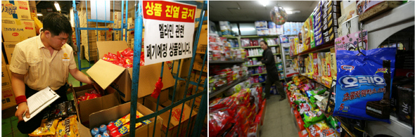 식약청이 멜라민 의심 성분 함유 식품 305개를 발표한 가운데 28일 오후 서울 응암동의 한 대형마트 직원이 해당식품들을 수거하고 정리하는 반면(사진 왼쪽) 마포구 도화동의 작은 슈퍼마켓에서는 해당 품목의 제품이 그대로 팔리고 있다. 김명진 기자 littleprince@hani.co.kr
