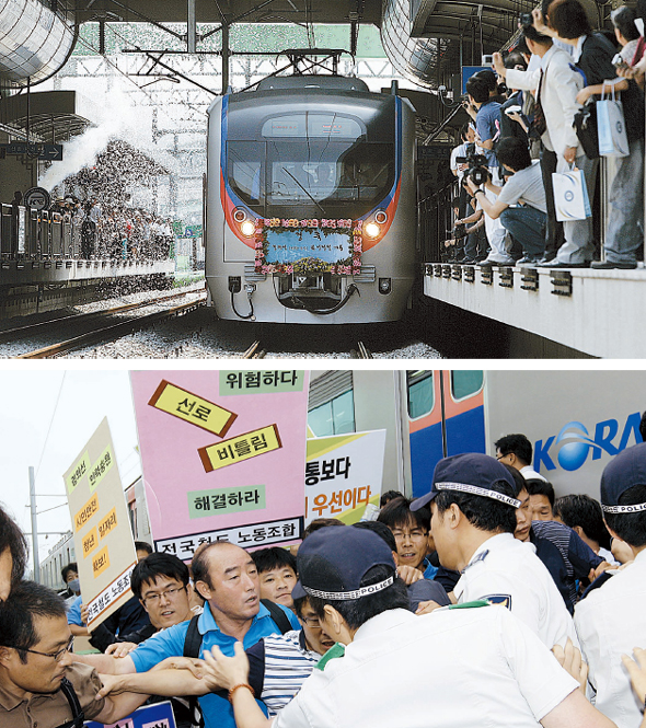  경의선(문산∼상암 DMC) 복선전철 개통식이 열린 경기 고양시 덕양구 행신역에서 1일 오전 시민들이 역에 들어서는 전철을 지켜보고 있다(위 사진). 같은 시각 행사장 부근에서 철도노조 조합원들이 ‘경의선 전철구간에 충분한 안전조치가 없이 열차운행이 이뤄지고 있다.’라며 철로 위에서 시위를 하고 있다.(아래) 고양/김명진 기자 <A href="mailto:littleprince@hani.co.kr">littleprince@hani.co.kr</A>