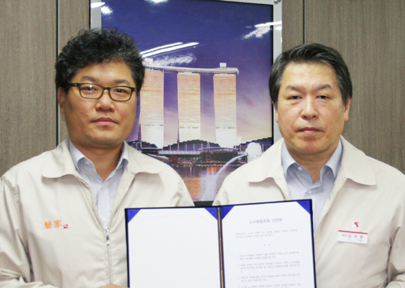 쌍용건설 김석준 대표이사 회장(사진 오른쪽), 김성한 노동조합위원장.