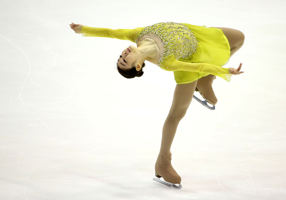 ‘피겨여왕‘김연아가 4일 오후 경기도 고양 덕양구 어울림누리 빙상장에서 열린 ‘KB금융 코리아 피겨스케이팅 챔피언십 2014‘ 시니어 여자 싱글 쇼트프로그램에서 멋진 연기를 선보이고 있다. 김연아는 이날 쇼트프로그램에서 80.60점을 받았다. 2014.1.4 /연합뉴스