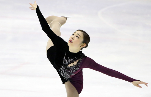 ‘피겨 여왕’ 김연아가 5일 오후 경기도 고양시 어울림누리 얼음마루 빙상장에서 열린 ‘KB금융 코리아 피겨스케이팅 챔피언십 2014’ 시니어 여자 싱글 프리스케이팅 경기에서 매혹적인 연기를 펼치고 있다. 2014. 1. 5 / 고양=연합뉴스