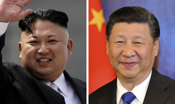 김정은 북한 노동당 위원장(왼쪽)과 시진핑 중국 국가주석(오른쪽).  AP 연합뉴스