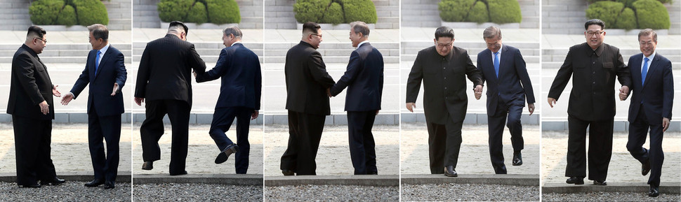 "김 위원장과 역사적인 악수를 하면서 남측으로 오시는데 나는 언제쯤 넘어갈 수 있을까요?" 문재인 대통령의 질문에 김정은 국무위원장은 "그럼 지금 넘어가볼까요?"라고 답했다. 두 사람이 5센티미터 높이의 군사분계선을 넘어갔다가 되돌아오고 있다. 김경호 선임기자 jijae@hani.co.kr