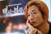 “택시에 탄 서울은 눈물만 남은 도시”