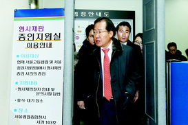 홍준표 지사 첫 공판 ‘1억원 전달’ 공방