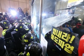 ‘민주노총 불법수색 경찰 상해’ 김정훈 전교조 전 위원장 무죄