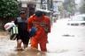 Firefighter rescuing flood victims 
